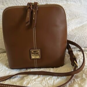 Dooney & Burke crossbody. Top 8” strap 43”fully open 8” 43”strap adjustable.